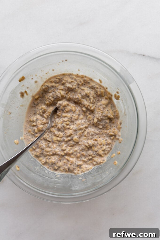 cinnamon roll overnight oats in a bowl
