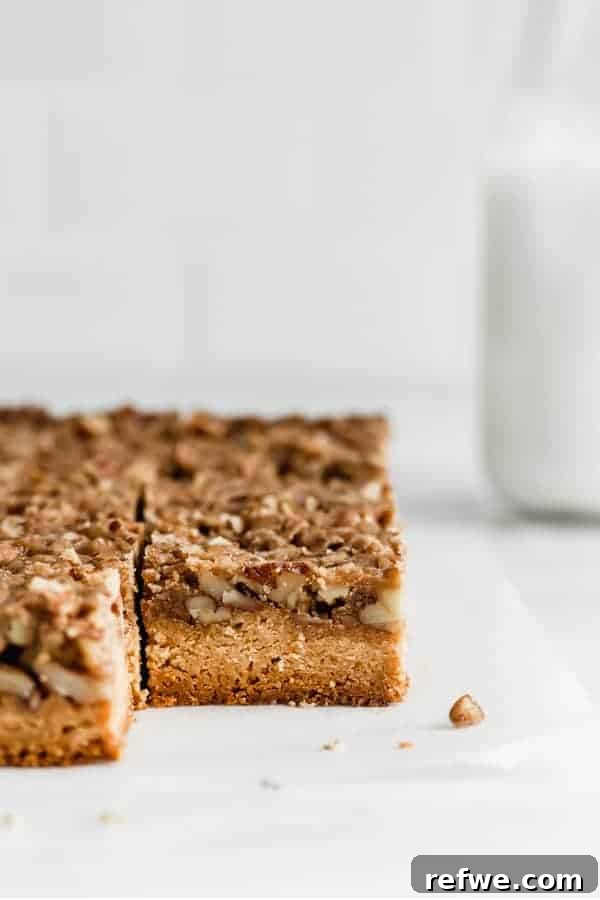 Festive & Fit: 18 Healthier Holiday Treats 17 Delicious Healthy Pecan Pie Bars with a crumbly almond flour crust and rich pecan topping, perfect for healthy holiday gatherings.