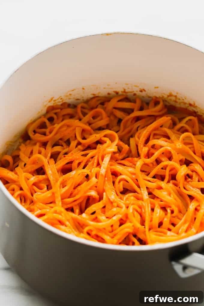 Spicy Thai Red Curry Noodles 10 A pot of finished Thai Red Curry Noodles before garnishing
