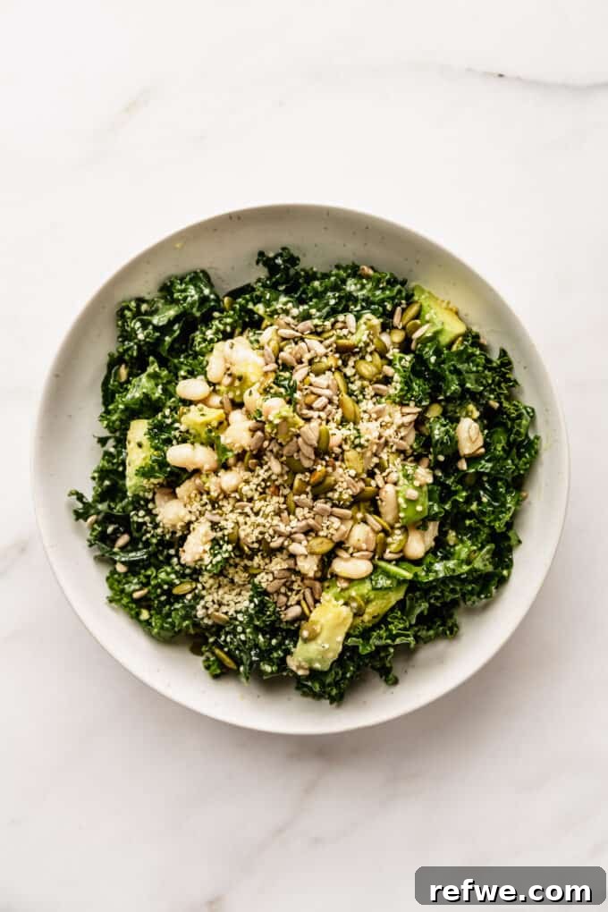 Hearty Kale and White Bean Power Bowl 7 A beautifully presented bowl of kale and white bean salad, garnished and ready to eat
