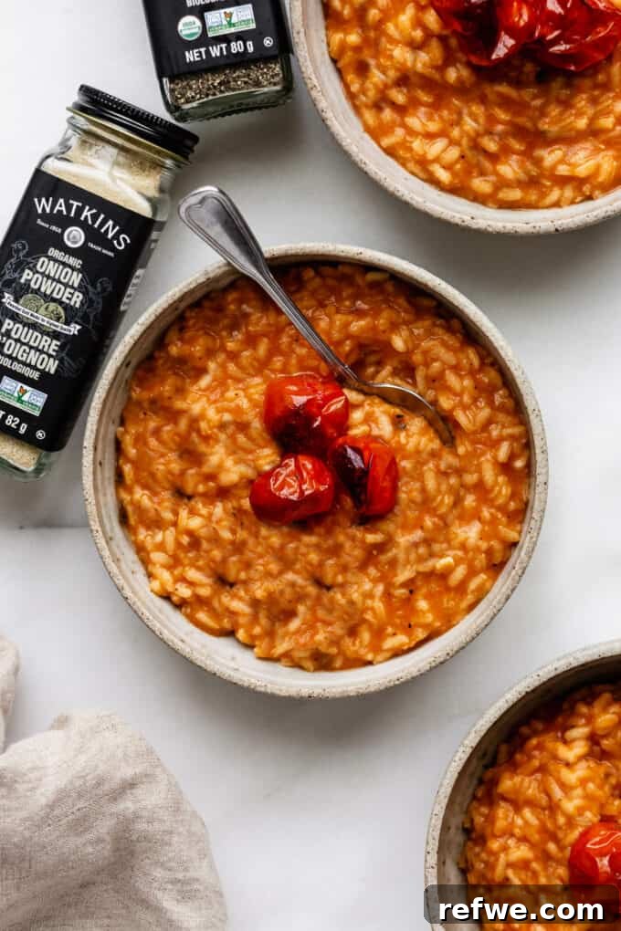 Romantic Tomato Risotto for Two 11 Three bowls of tomato risotto with onion powder on the side
