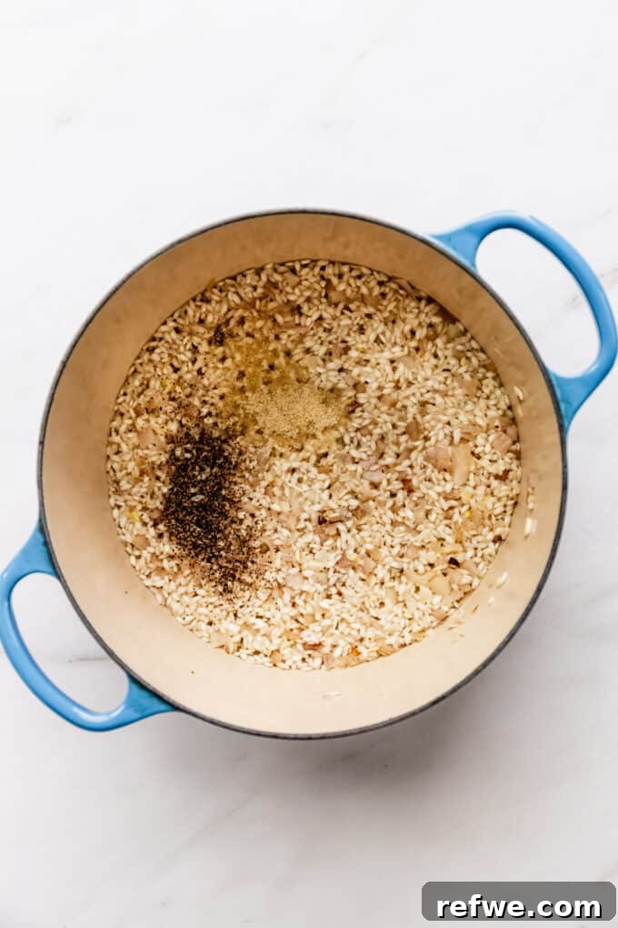 Romantic Tomato Risotto for Two 5 Arborio rice and spices toasting in a blue pot