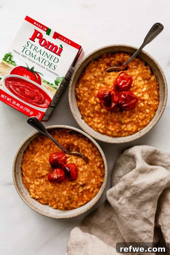 Romantic Tomato Risotto for Two 10 Two bowls of tomato risotto with strained tomatoes on the side