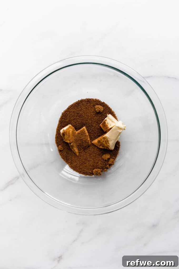 coconut sugar and butter in a mixing bowl being creamed together