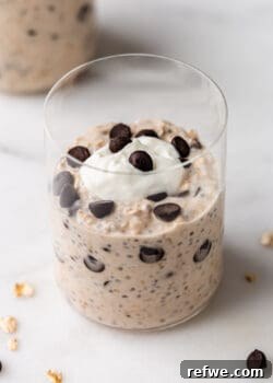A cup of cookie dough overnight oats topped with chocolate chips, captured beautifully for the recipe card.