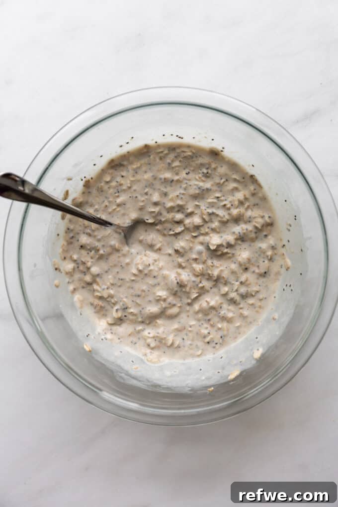 Dreamy Cookie Dough Oats 7 All ingredients for cookie dough overnight oats mixed thoroughly in a bowl.