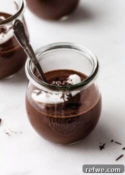 vegan chocolate pudding in a cup with a spoon