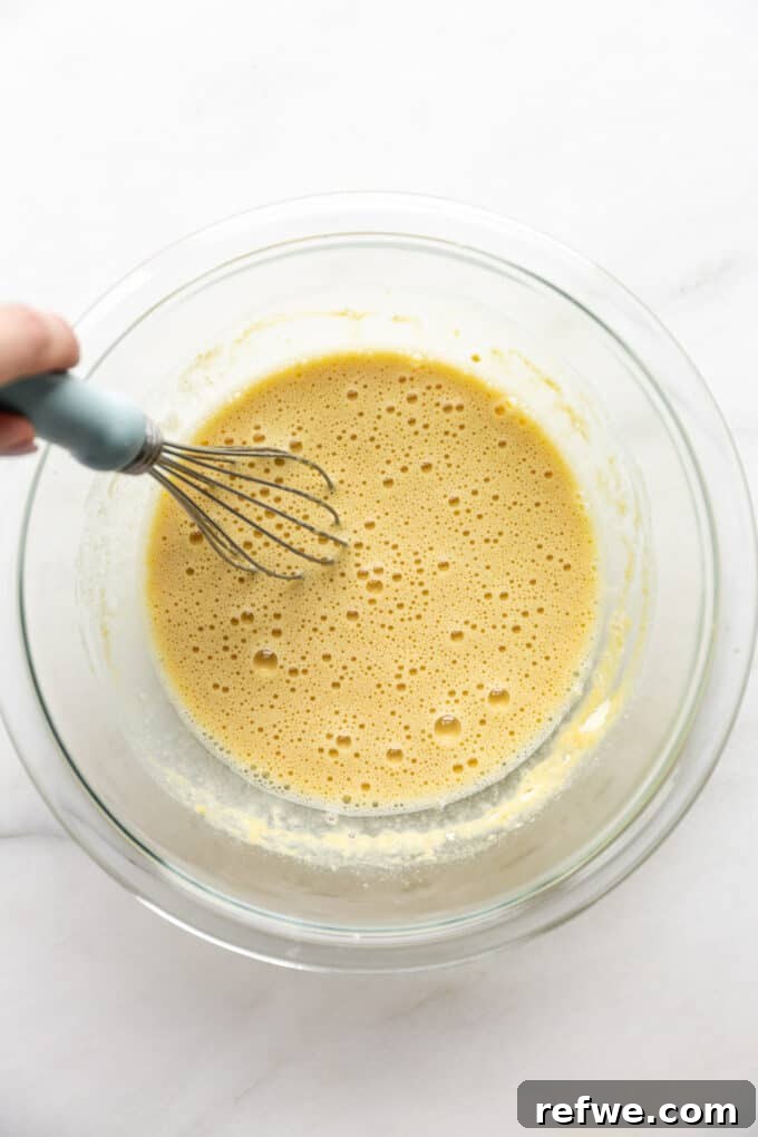 chickpea flour omelette batter in a mixing bowl