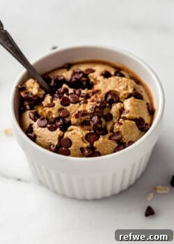 Cookie baked oats topped with chocolate chips in a ramekin