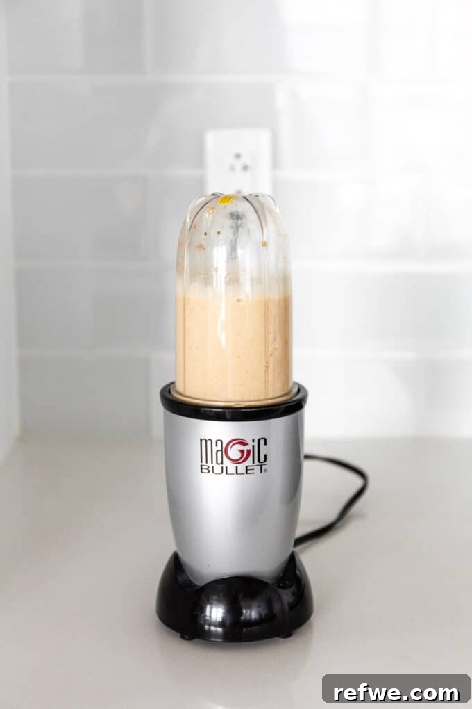 Cookie Dough Baked Oatmeal 5 Smooth and creamy cookie baked oatmeal batter blended in a small personal blender, ready to be poured