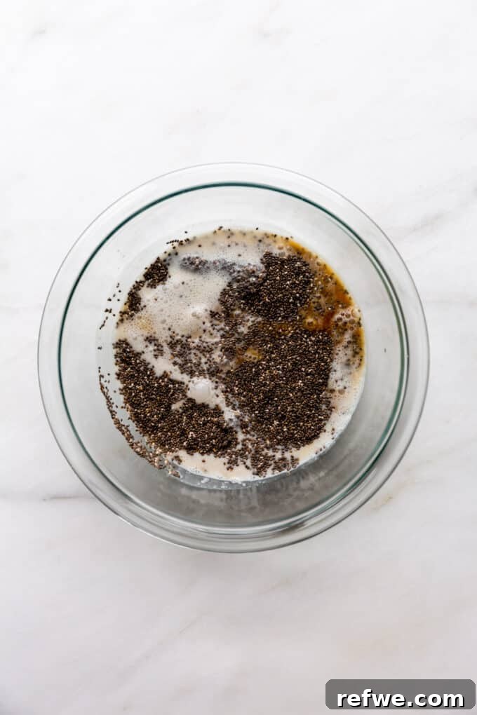 Decadent Coffee Chia Delight 4 Chia seeds, coconut milk, and coffee being added to a mixing bowl, ready to be combined.
