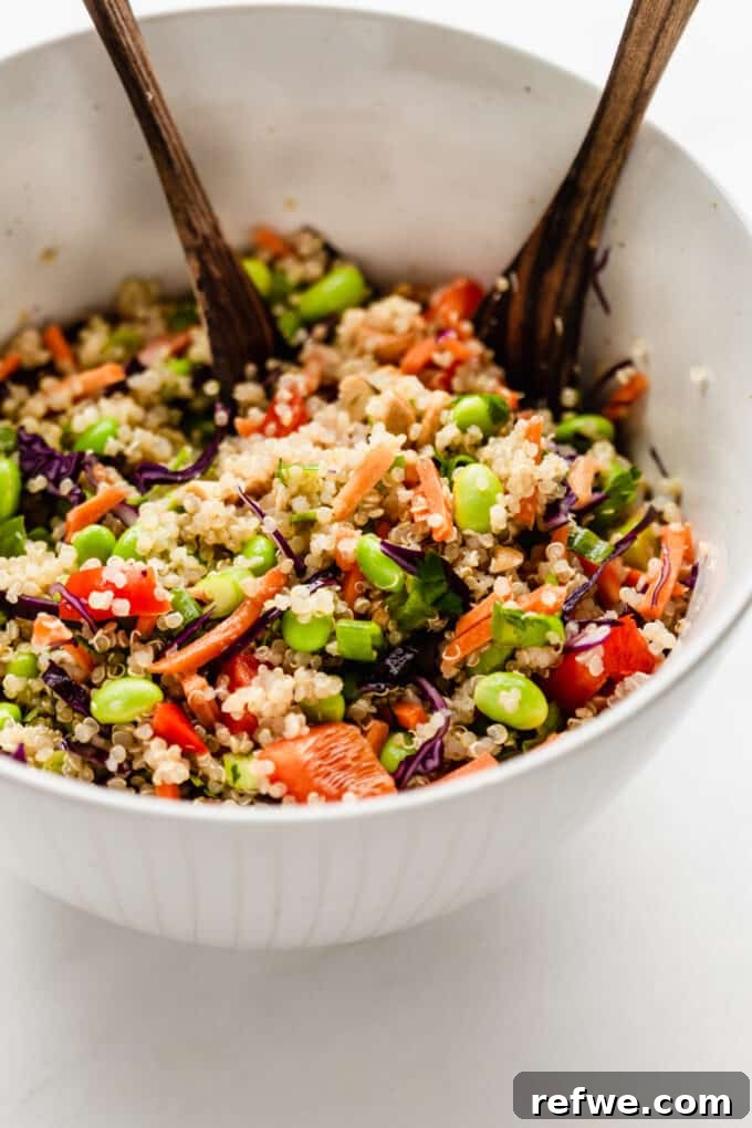 Wholesome Quinoa Edamame Crunch Bowl 6 A mixing bowl with edamame and quinoa salad, perfectly tossed and ready to serve