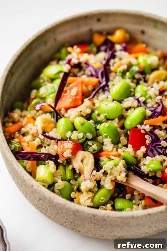 Wholesome Quinoa Edamame Crunch Bowl 7 A close up of edamame quinoa salad in a bowl, showing the texture and vibrant colors