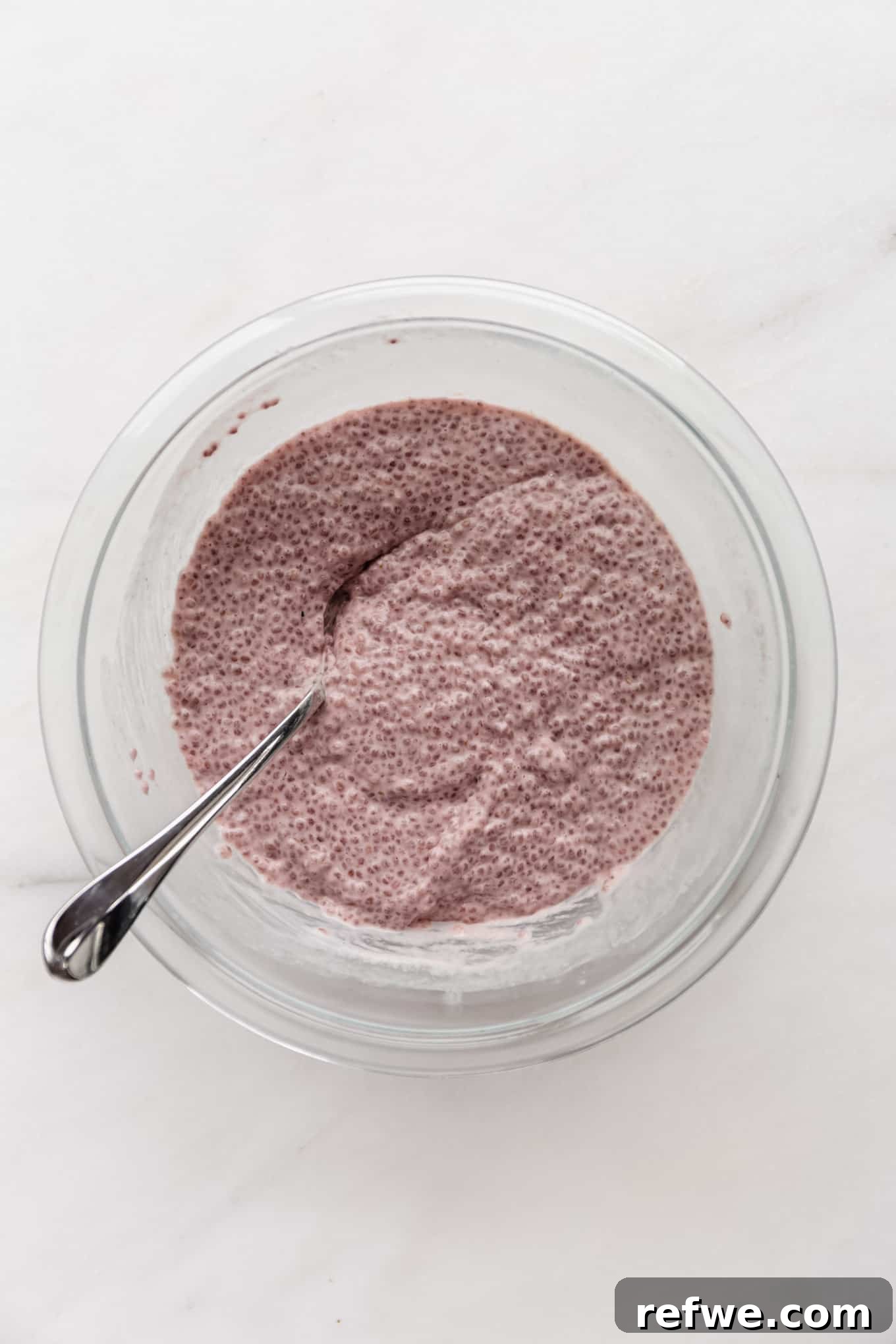 Strawberry Chia Delight 8 Strawberry chia pudding in a bowl, ready to be chilled