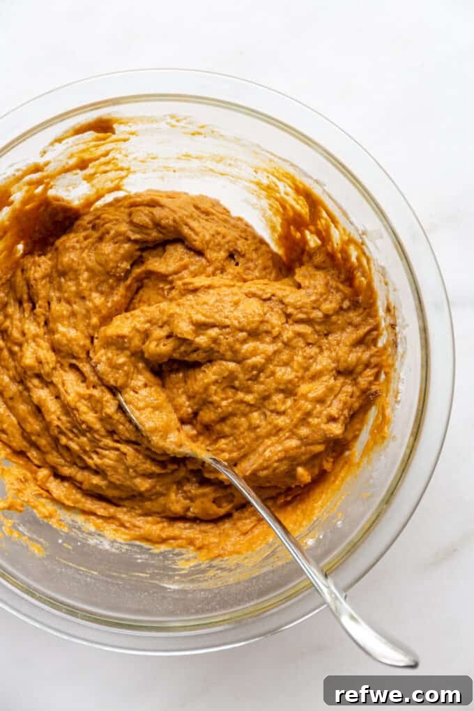 Wholesome Pumpkin Banana Loaf 6 pumpkin banana bread batter in a mixing bowl