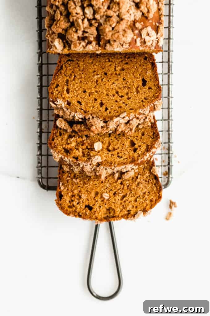 Wholesome Pumpkin Banana Loaf 10 Pumpkin banana bread sliced on a cooling rack