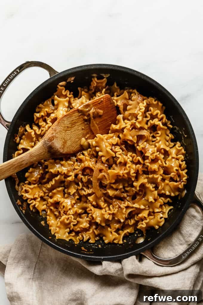 Creamy French Onion Pasta Skillet 9 Finished One-Pot French Onion Pasta, creamy and golden, ready to be served from the pot.