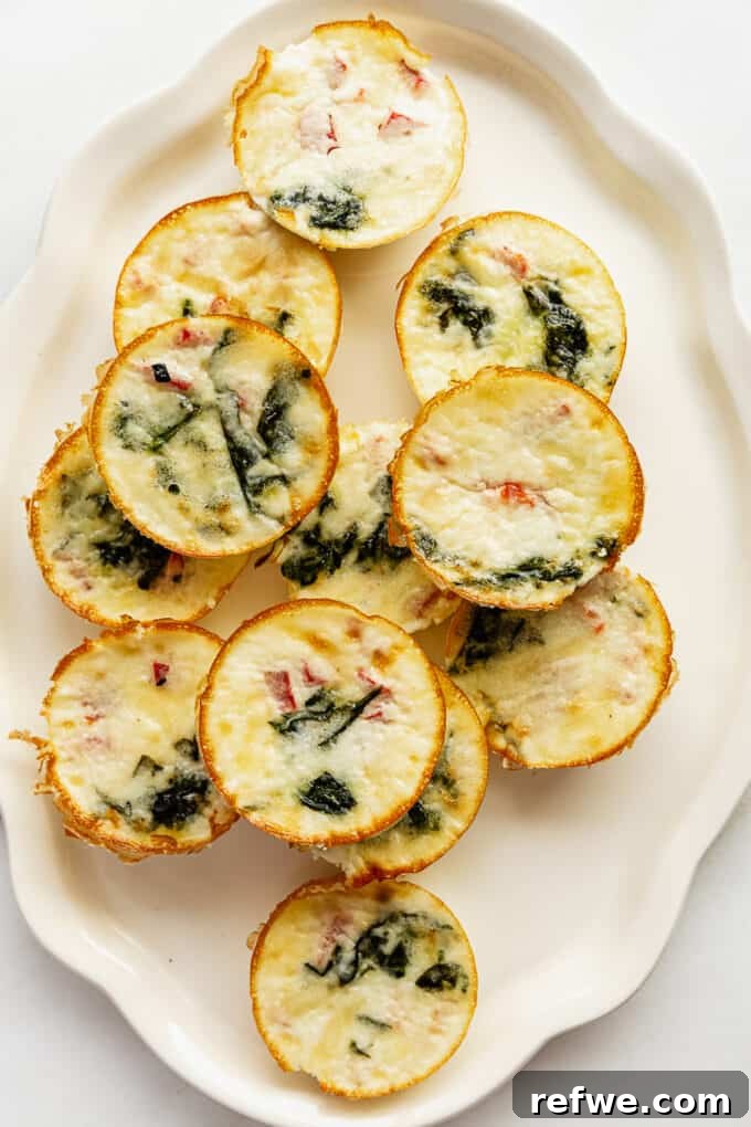 Lean Protein Egg Cups 8 A beautifully arranged platter of freshly baked egg white bites, ready for serving.