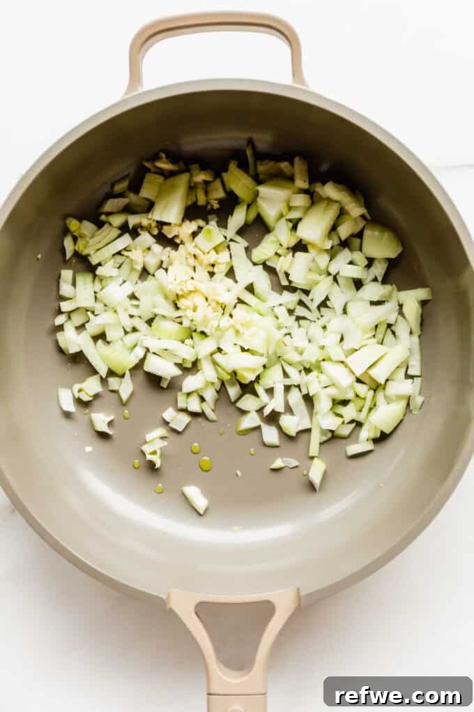 Spring Pea Ricotta Pasta 5 Finely chopped onions and garlic sizzling in olive oil in a large skillet.