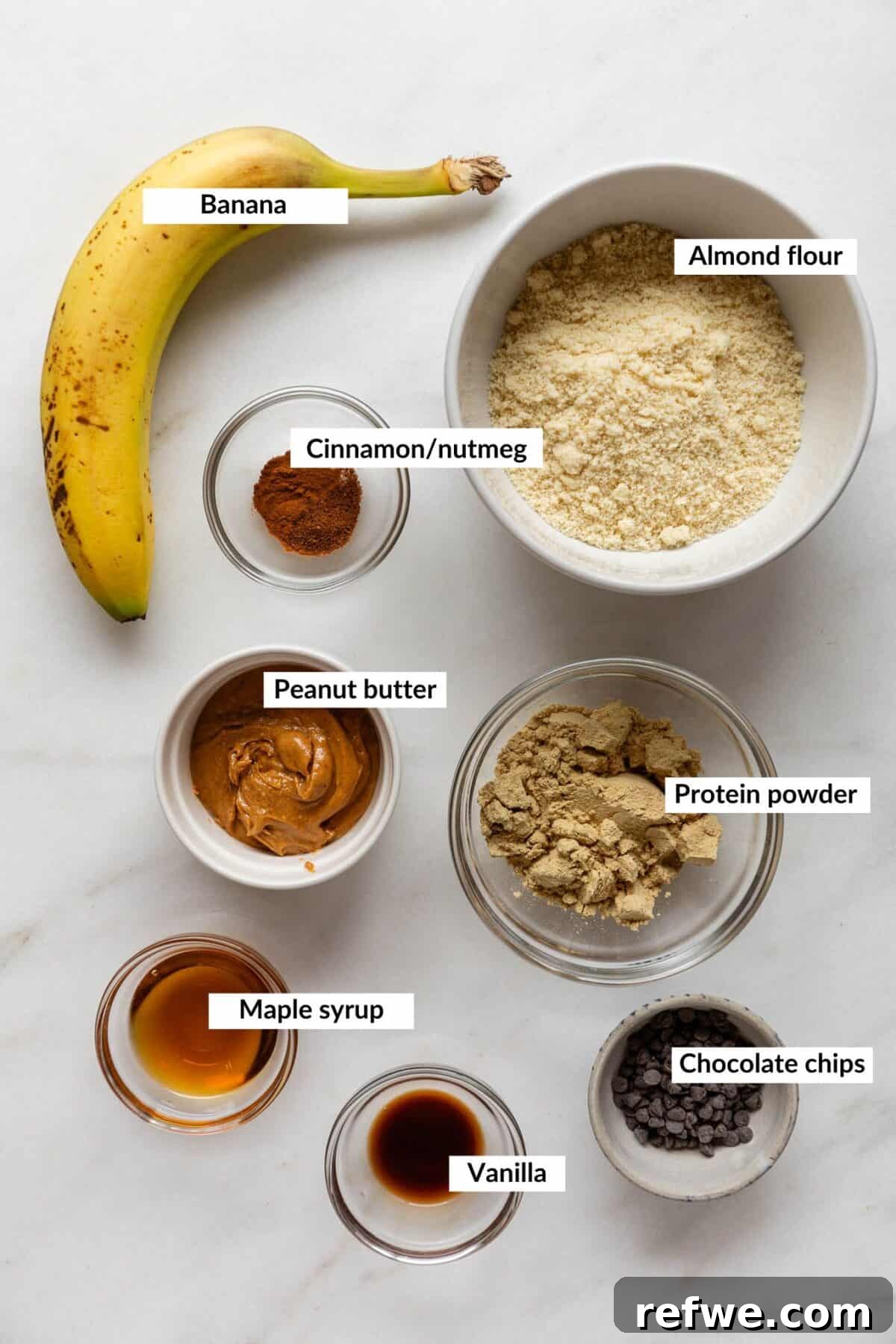 A selection of key ingredients for banana protein balls laid out on a surface.