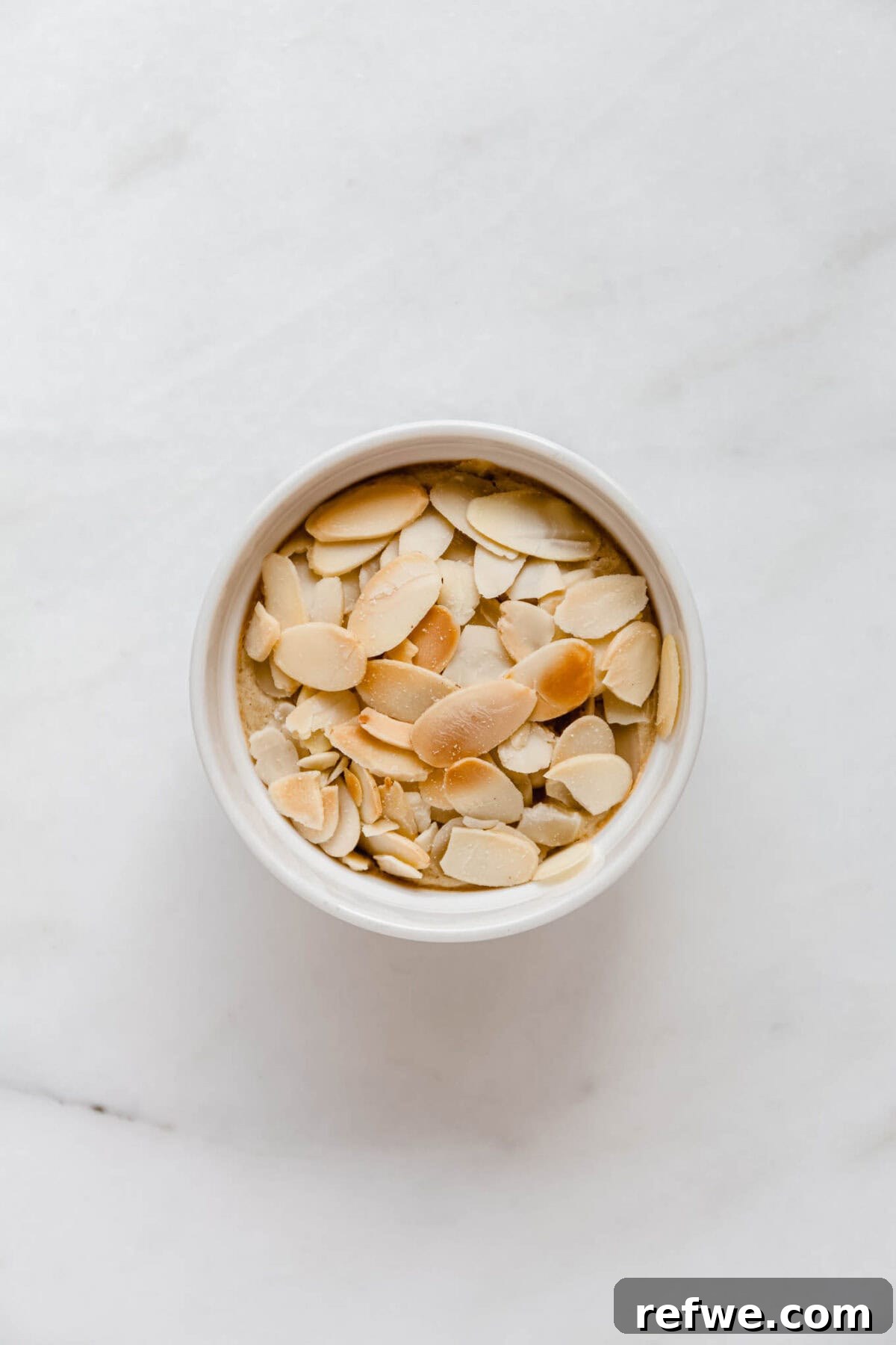 Almond croissant baked oats baking in an oven at 350 degrees F.
