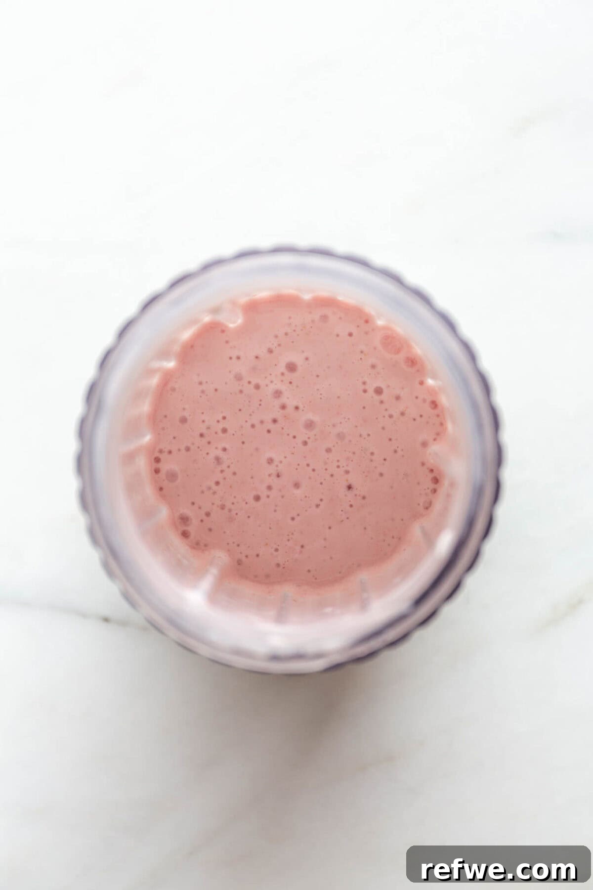 Supercharged Protein Chia Pudding 5 Blended cottage cheese, raspberries, maple syrup and vanilla in a blender container.