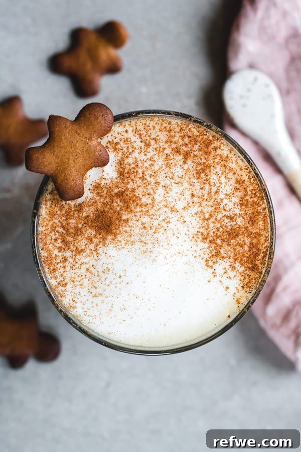 Festive gingerbread latte with a sprinkle of cinnamon
