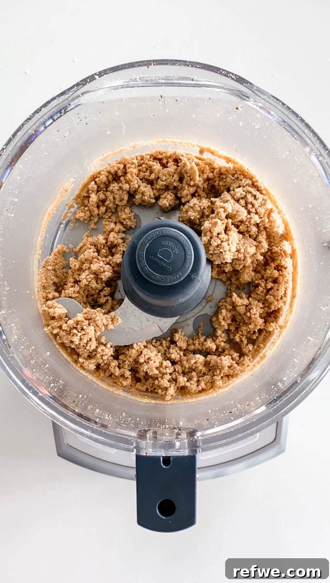 Plant-Based Hazelnut Cacao Dream 8 Smooth hazelnut butter forming in the food processor.