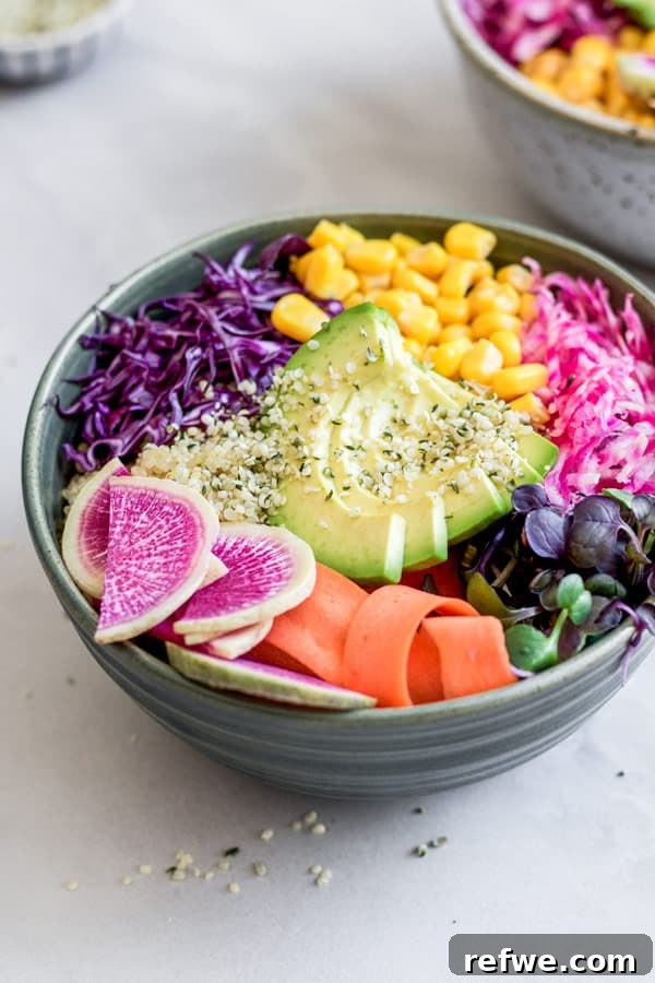 Vibrant Rainbow Wellness Bowls with Maple Tahini Drizzle 6 Rainbow nourishment bowl ingredients: quinoa, cabbage, carrots, corn, beets, sprouts, radishes, avocado