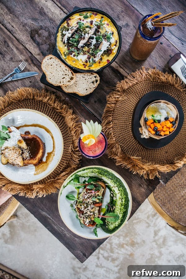 Gourmet breakfast spread with various dishes at Moro, Habitas Tulum