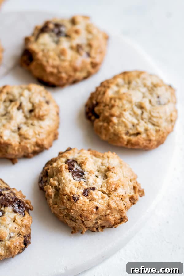 A serving platter with Chocolate Chunk Tahini Oatmeal Cookies, beautifully presented.