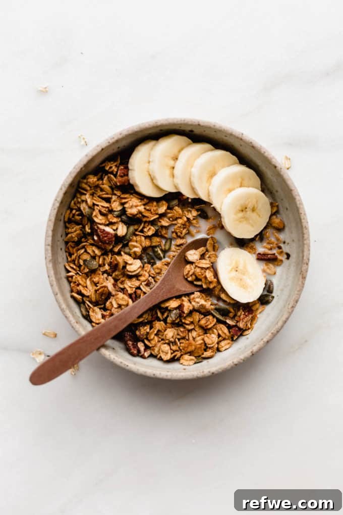 Cozy Autumn Granola 2 A beautiful bowl of homemade pumpkin spice granola, perfectly golden brown and inviting.