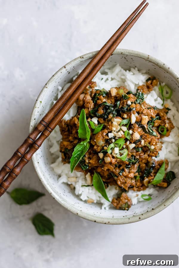 Fragrant Thai Basil Tempeh Stir-Fry 4 Overhead shot of Thai basil tempeh stir fry in a serving bowl, ready to be enjoyed.