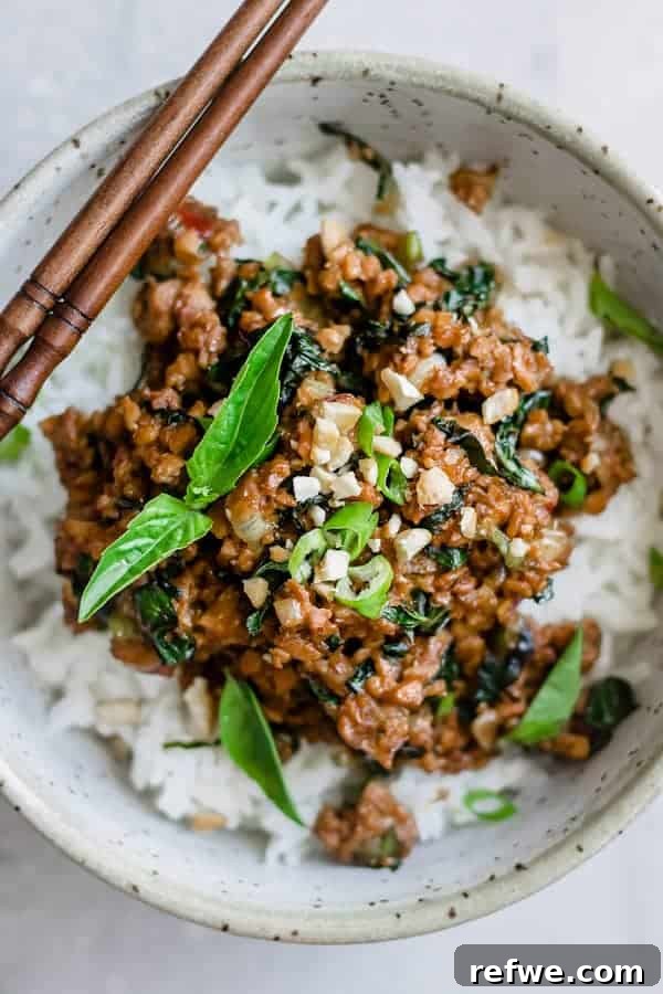 Fragrant Thai Basil Tempeh Stir-Fry 5 A serving of Thai basil tempeh stir fry, showcasing the vibrant colors of the ingredients and the savory sauce.