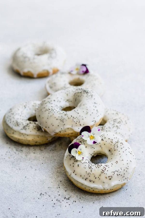 Delicious baked vegan lemon poppy seed donuts with a sweet glaze