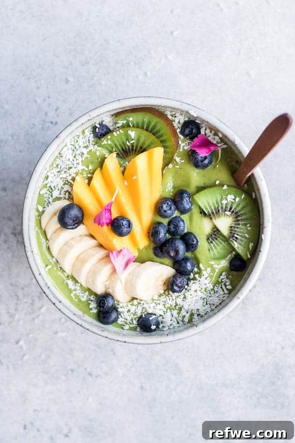 Power-Packed Green Smoothie Bowl 2 Superfood Green Smoothie Bowl with fresh fruit toppings