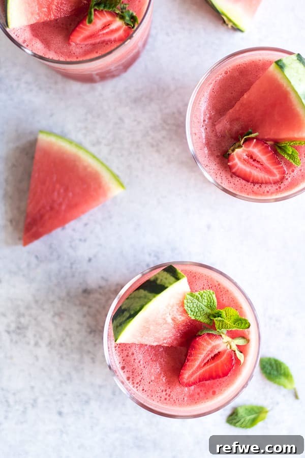 Watermelon Mojito Frosé with ingredients in the background