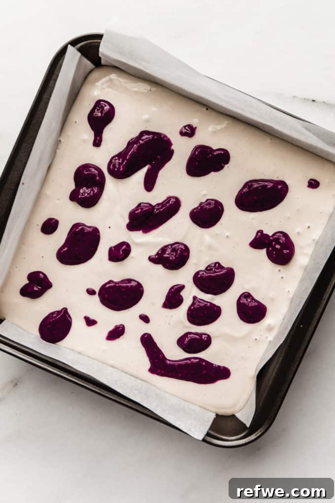 Dairy-Free Blueberry Bliss 10 vegan blueberry cheesecake with dollops of blueberry compote on top
