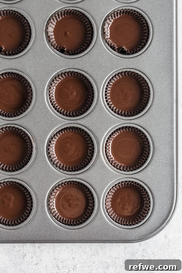 Pumpkin Chocolate Dream Cups 3 Close-up of healthy chocolate pumpkin butter cups with fall decor