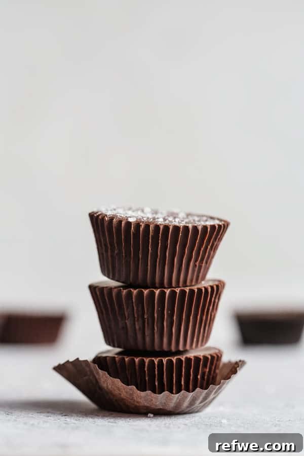 Pumpkin Chocolate Dream Cups 5 Overhead shot of chocolate pumpkin butter cups with a sprinkle of spice for extra flavor