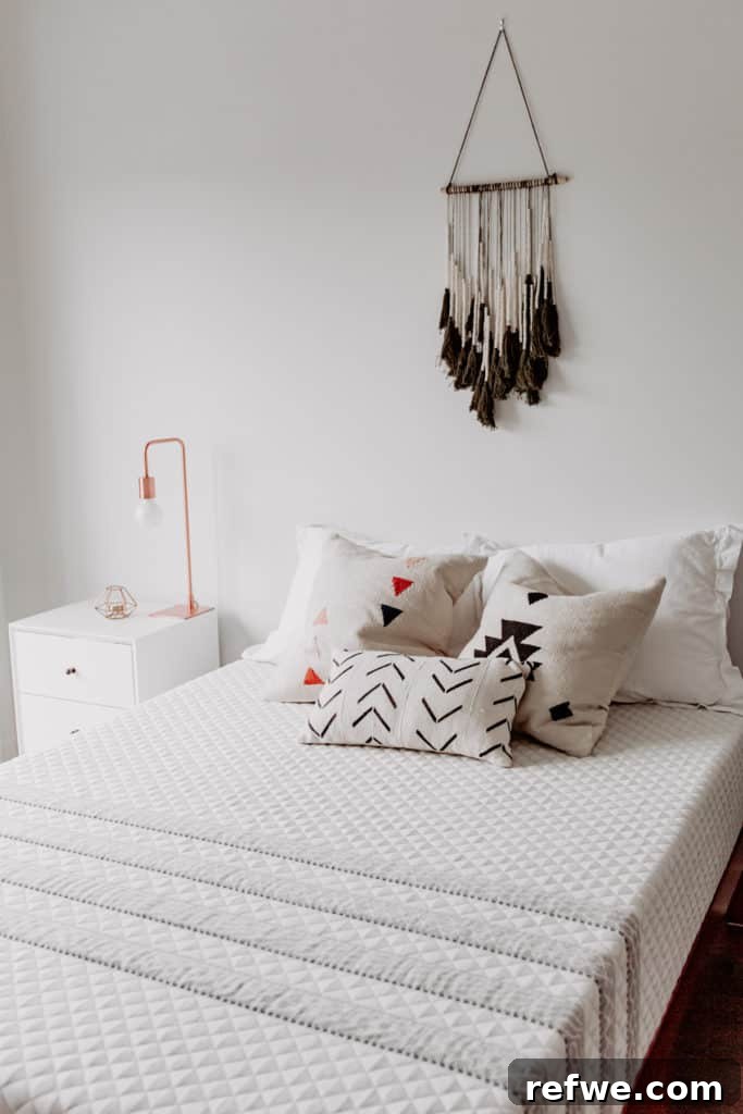 Indulgent Mornings Breakfast in Bed Secrets 5 A clean, minimalist shot of a Leesa mattress dressed with inviting pillows, ready for a luxurious morning.