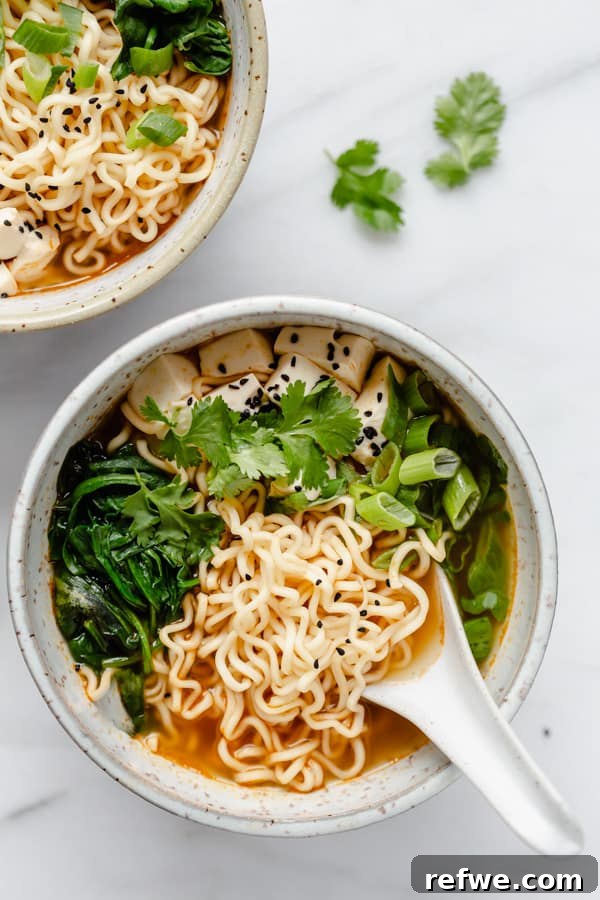 Effortless Vegan Ramen Fix 3 Vegan ramen in broth with a spoon and full bowl