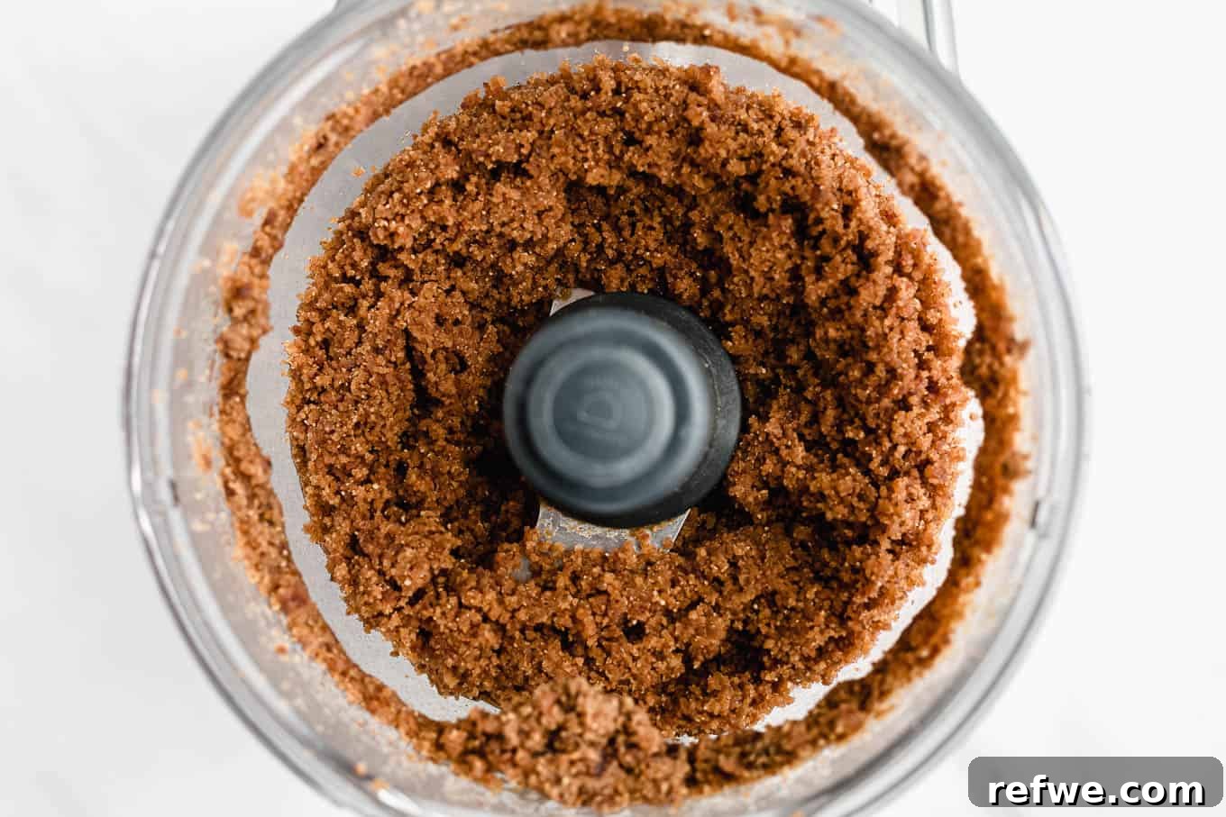 Crispy Quinoa Nut Bars 10 Peanut butter and dates blended into a sticky mixture in a food processor.