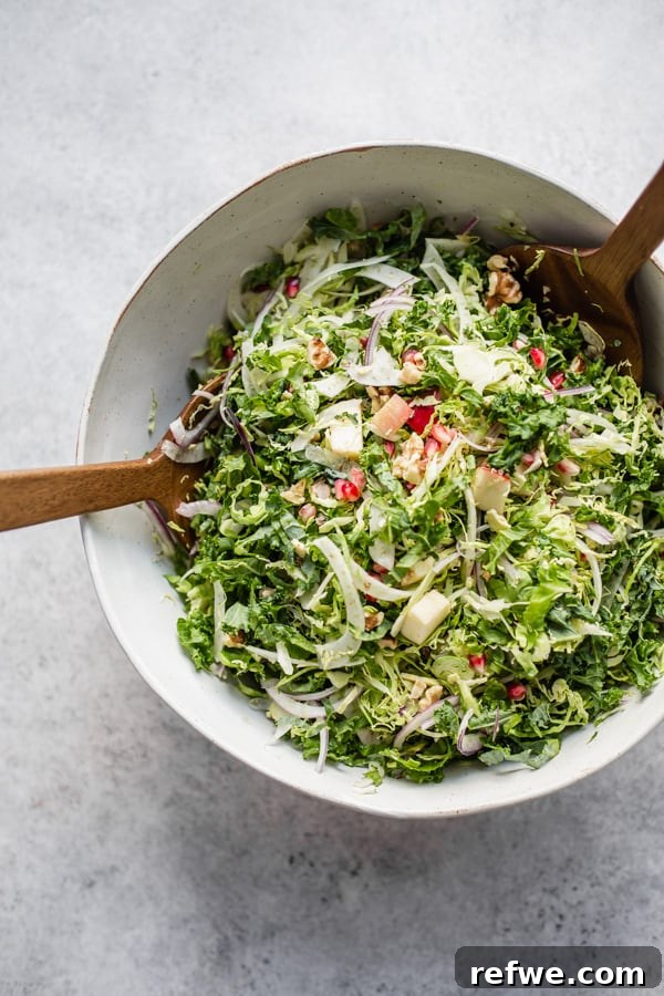 Crisp Brussels Sprout Fennel and Apple Slaw 4 Maple Dijon Dressing drizzled over a fresh fall salad