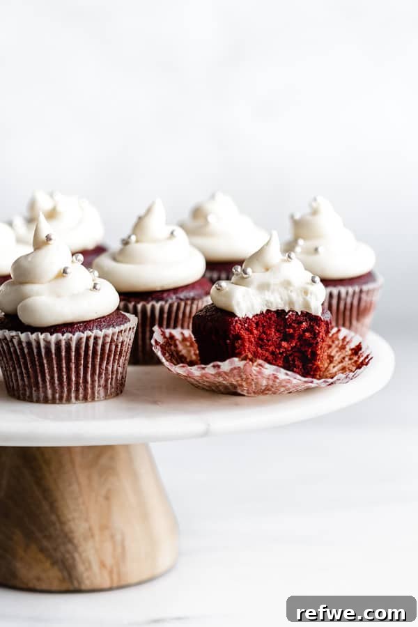 Luscious Vegan Red Velvet Cupcakes 5 vegan red velvet cupcakes on marble cake stand