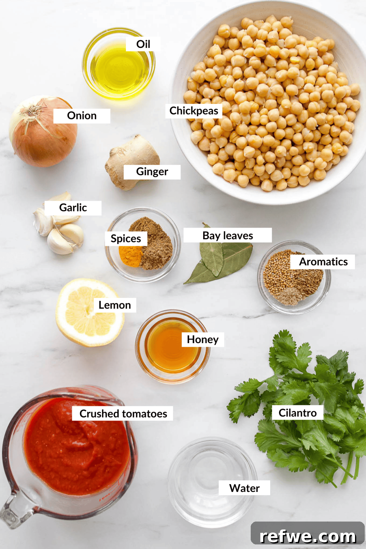 Chef's Special Chana Masala 3 Ingredients for Chana Masala, including chickpeas, spices, and aromatics.