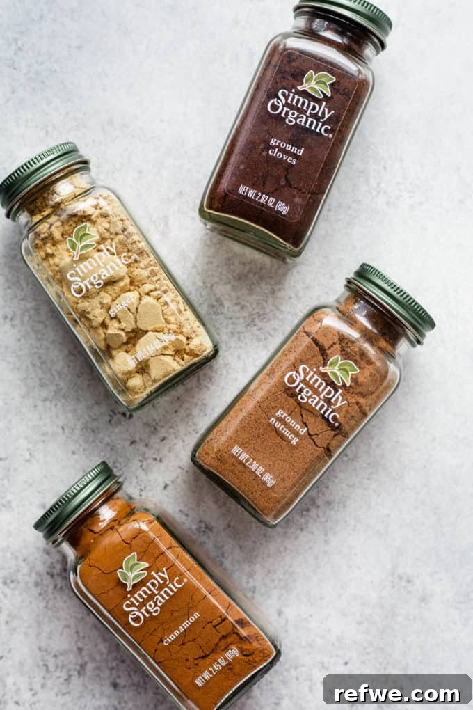 Simply organic spices in their jars, showcasing the quality ingredients used in the gingerbread spice blend.