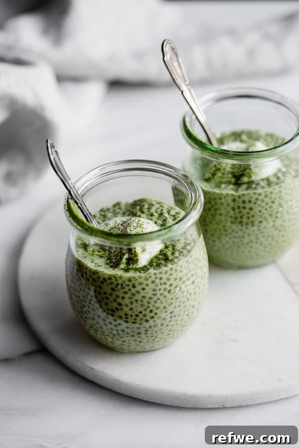Vibrant Matcha Chia Pudding 7 A single jar of perfectly set matcha latte chia pudding, ready to be garnished and enjoyed.