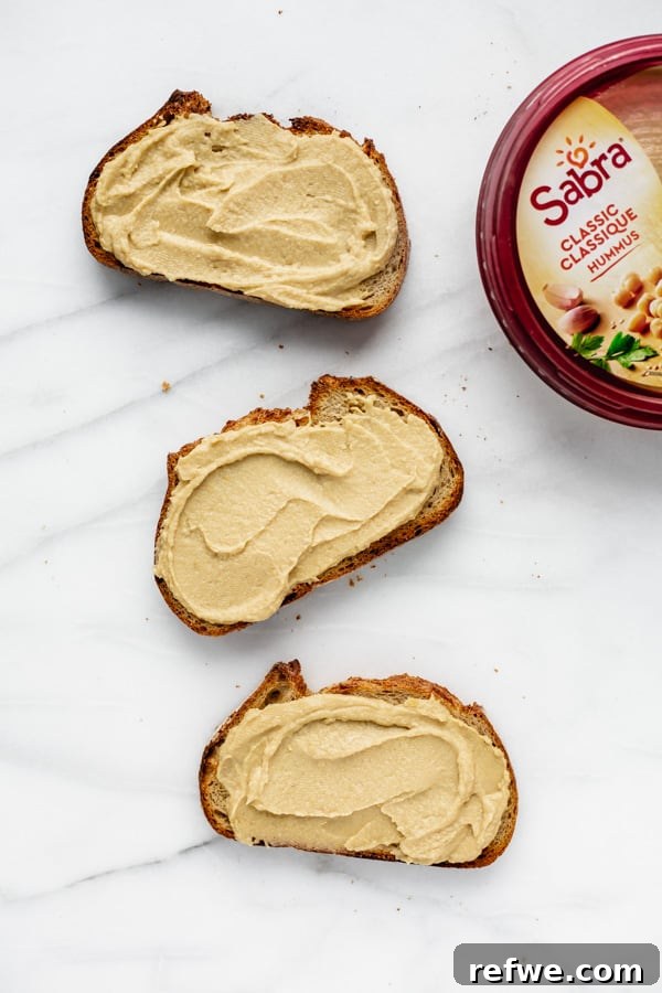 hummus toast with various delicious toppings