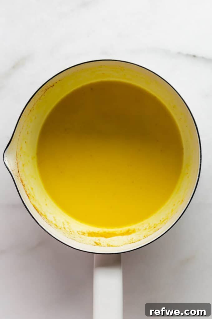 Golden Turmeric Elixir 5 turmeric latte in a white pot